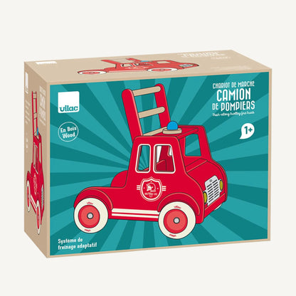 A boxed wooden fire engine baby walker displayed with product illustration and packaging details including age suitability and features.