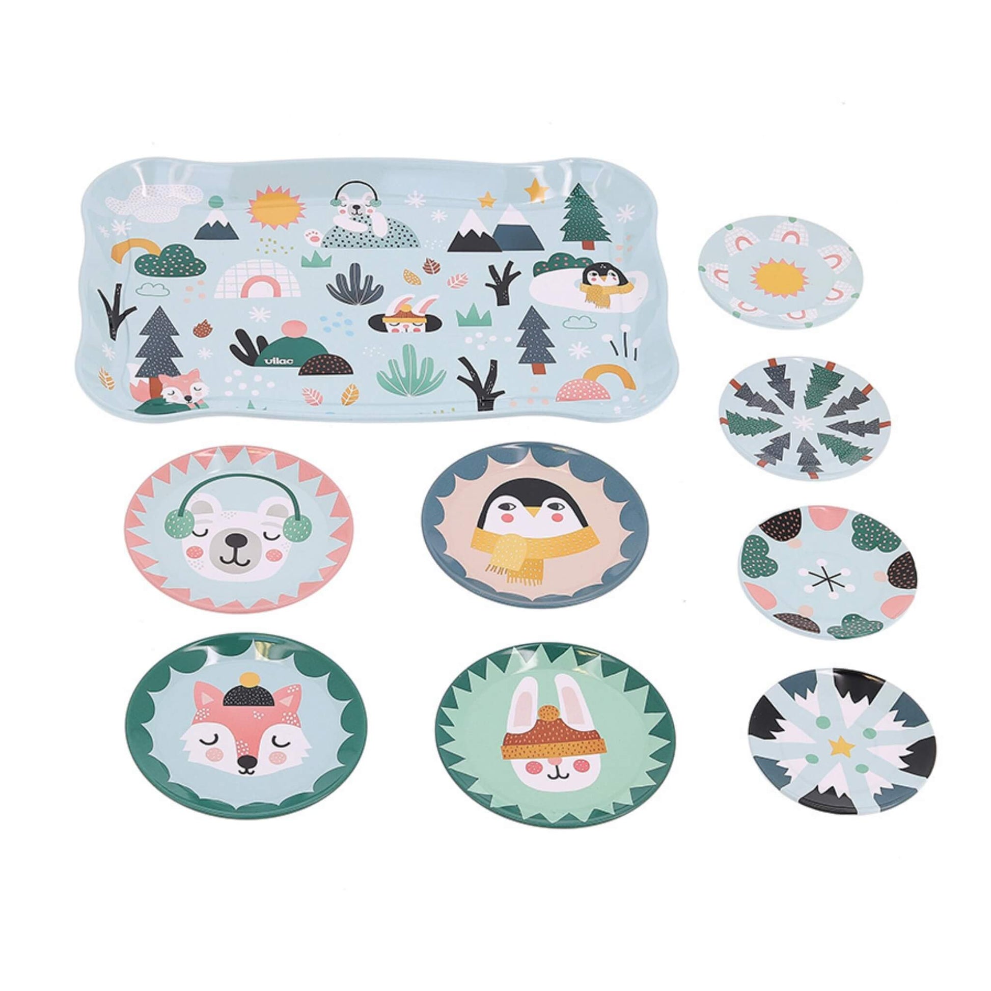 A rectangular tray with an Iceland-themed illustration surrounded by eight small round tin plates, each decorated with animals, trees or patterns.