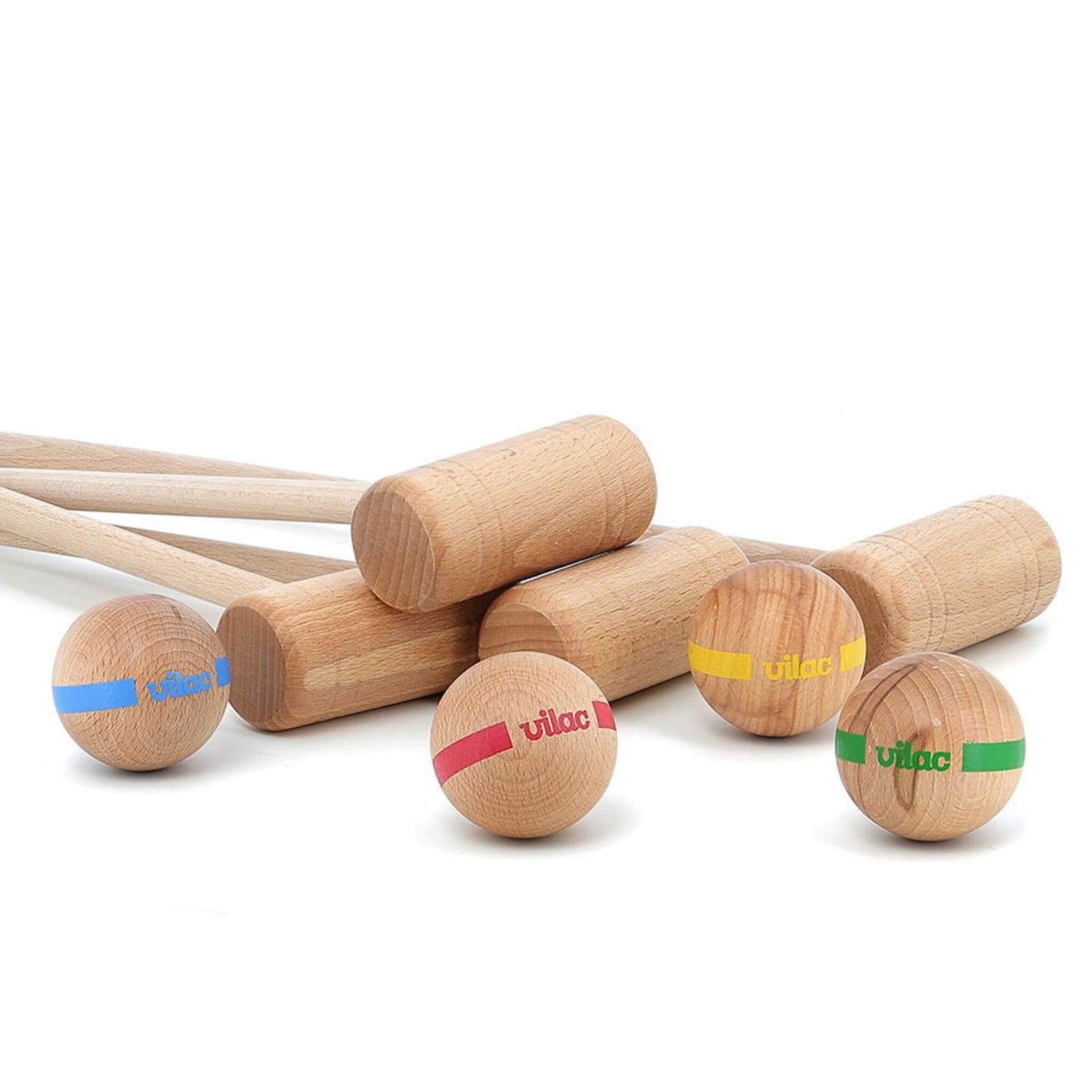 Four wooden croquet mallets laid out with four coloured balls marked in blue, red, yellow, and green.