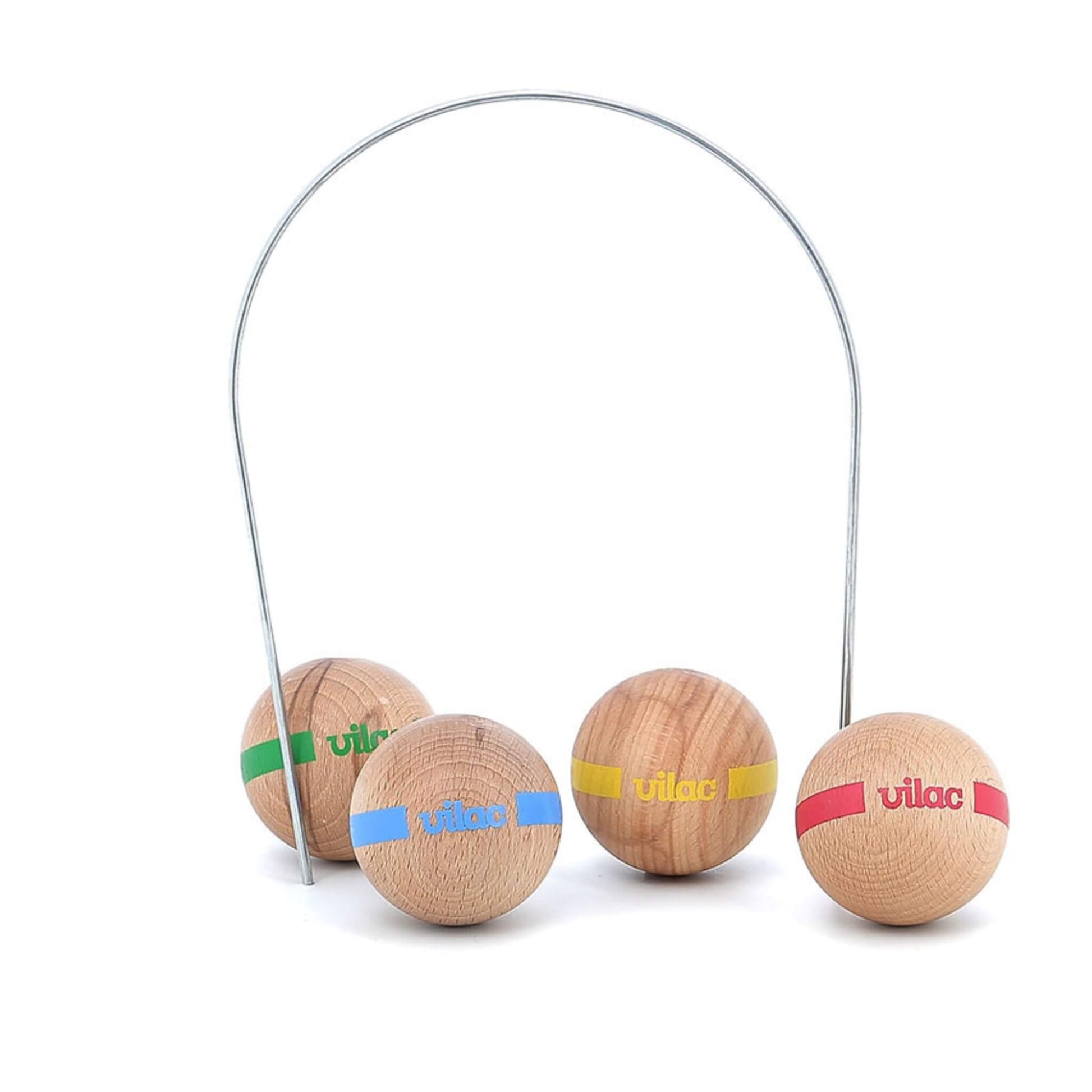 Four wooden croquet balls in red, blue, yellow, and green positioned beneath a single metal hoop.