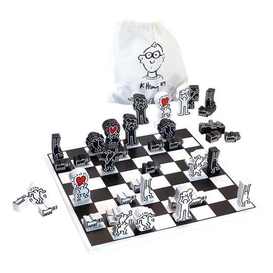 Vilac Keith Haring wooden chess set with black and white board and colourful art-inspired pieces, designed for children and families to enjoy classic chess.