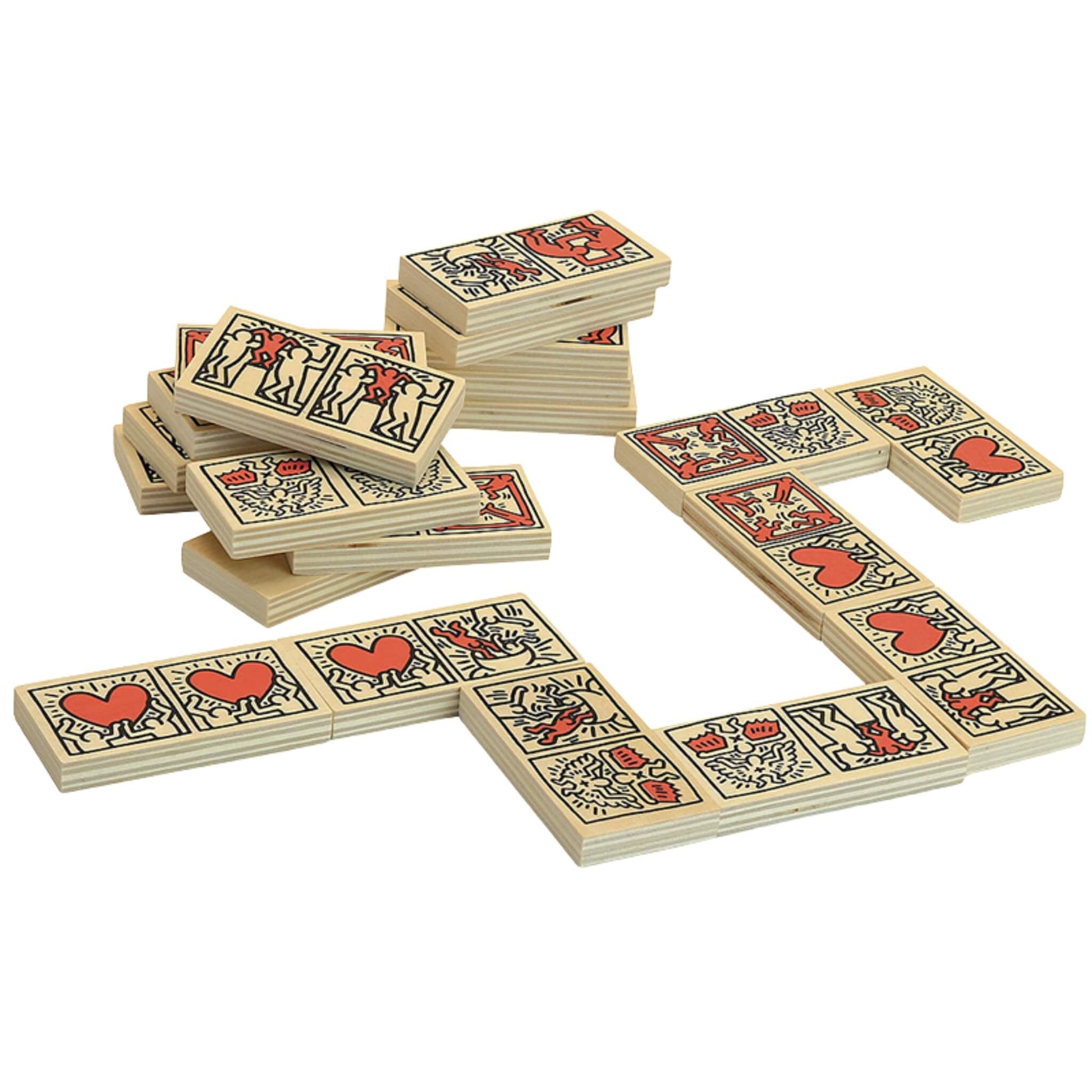 Wooden domino tiles with art illustrations of red hearts and figures, shown stacked and in play formation on a white surface.