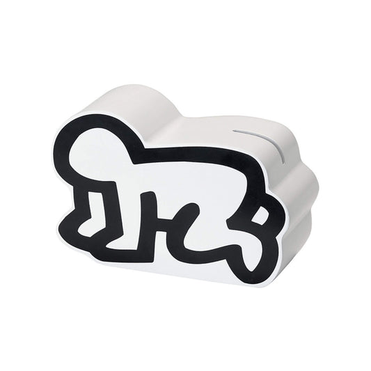 The Vilac Keith Haring Money Box shaped like the artist’s iconic crawling baby figure in black and white.