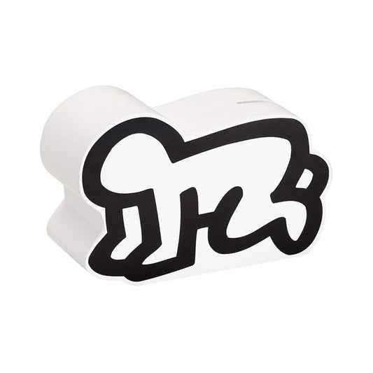 A wooden money box shaped as a crawling baby, viewed from the opposite angle with a smooth surface and slot visible.