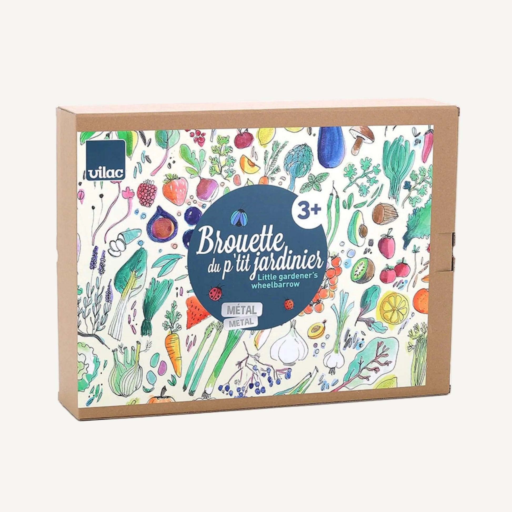 A product packaging box showing illustrated children’s wheelbarrow with colourful vegetable pattern and age suitability label.