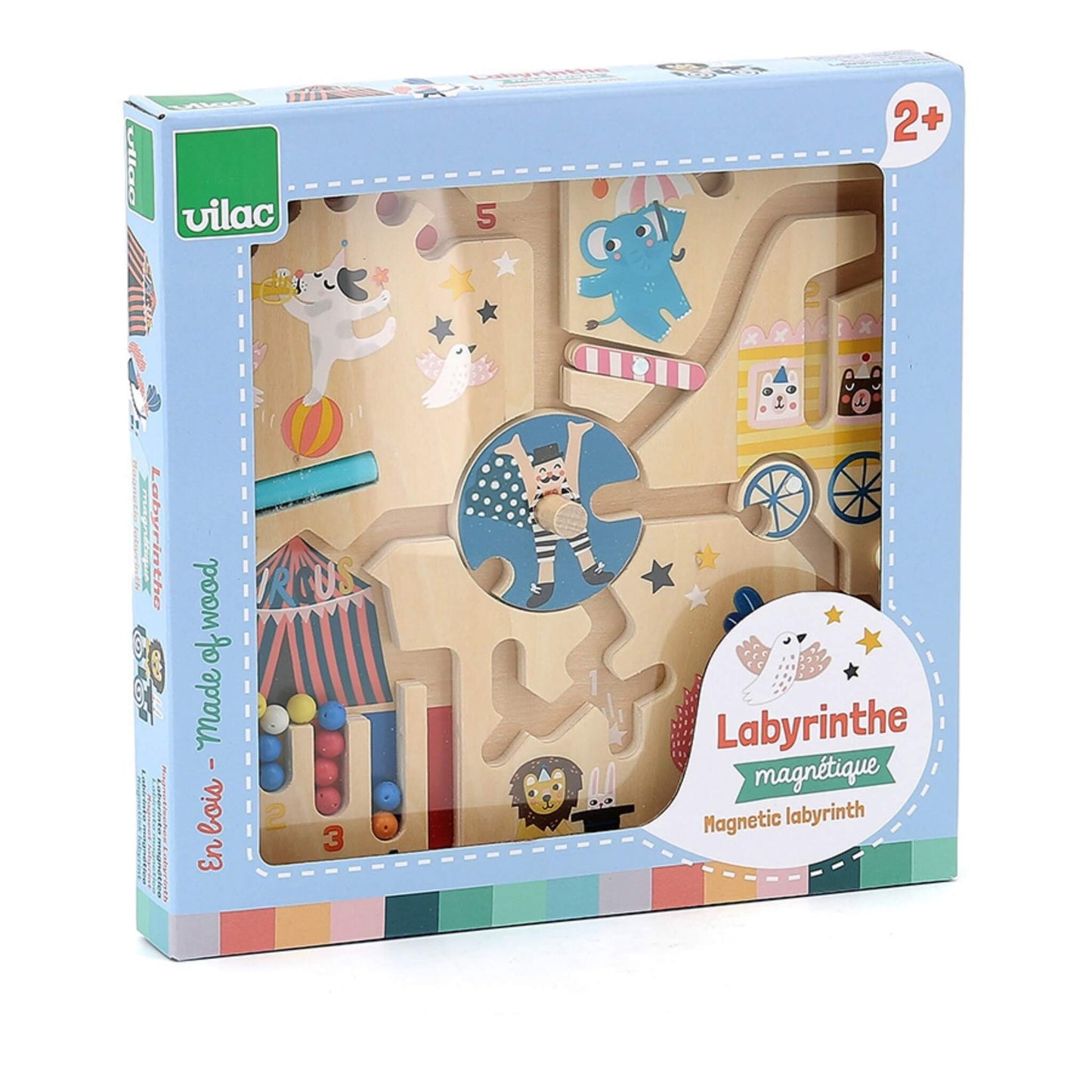 Front of a wooden magnetic maze with circus theme, showing animals, performers and beads on winding tracks, packaged in a blue Vilac box marked Labyrinthe Magnétique.
