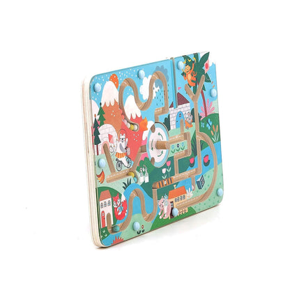 A wooden magnetic maze board standing upright, with illustrated paths, animals, and magnetic beads visible, shown with its blue magnetic stylus.