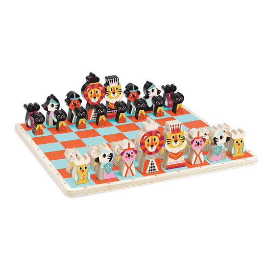 Vilac My First Chess set displayed on a wooden board with colourful red and turquoise squares, featuring playful animal-shaped wooden chess pieces in two teams.