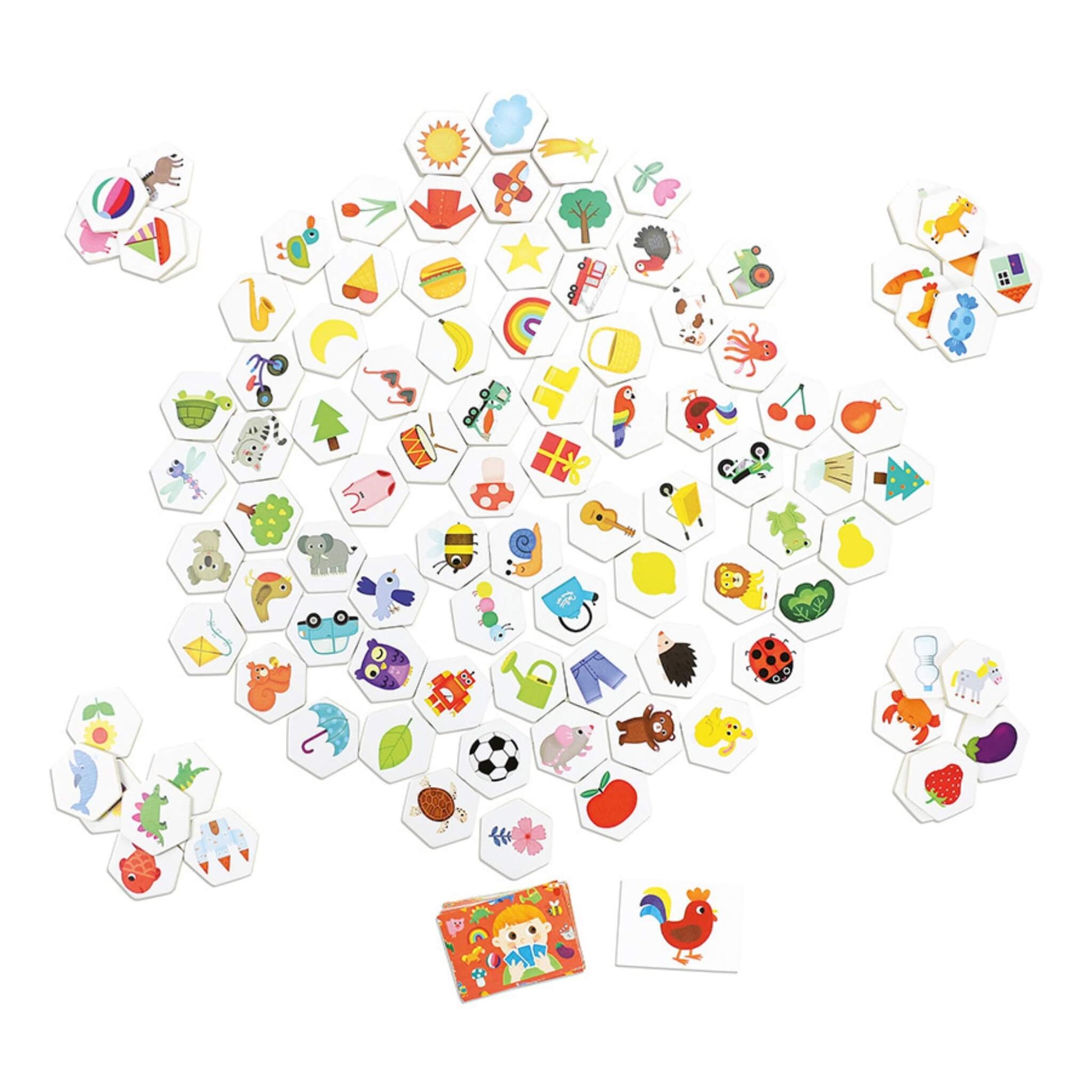 A collection of colourful hexagonal wooden tiles laid out, each featuring an illustrated object such as animals, fruits, toys and everyday items.