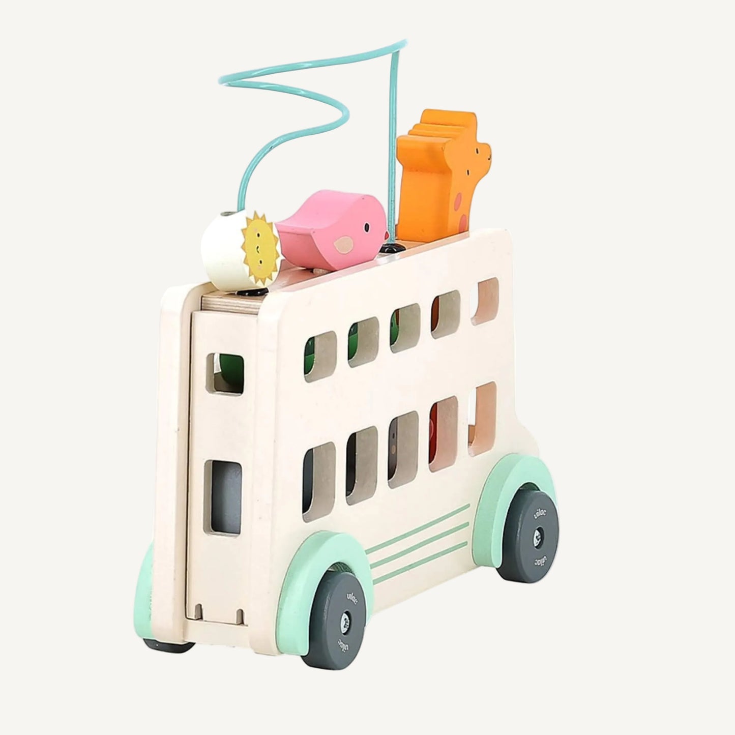 Side view of wooden toddler activity bus showing bead maze, animal pieces and pastel wheels.