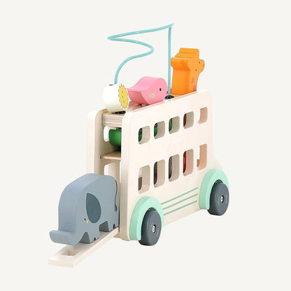 Wooden activity bus toy with sliding elephant shape piece and opening side panel.