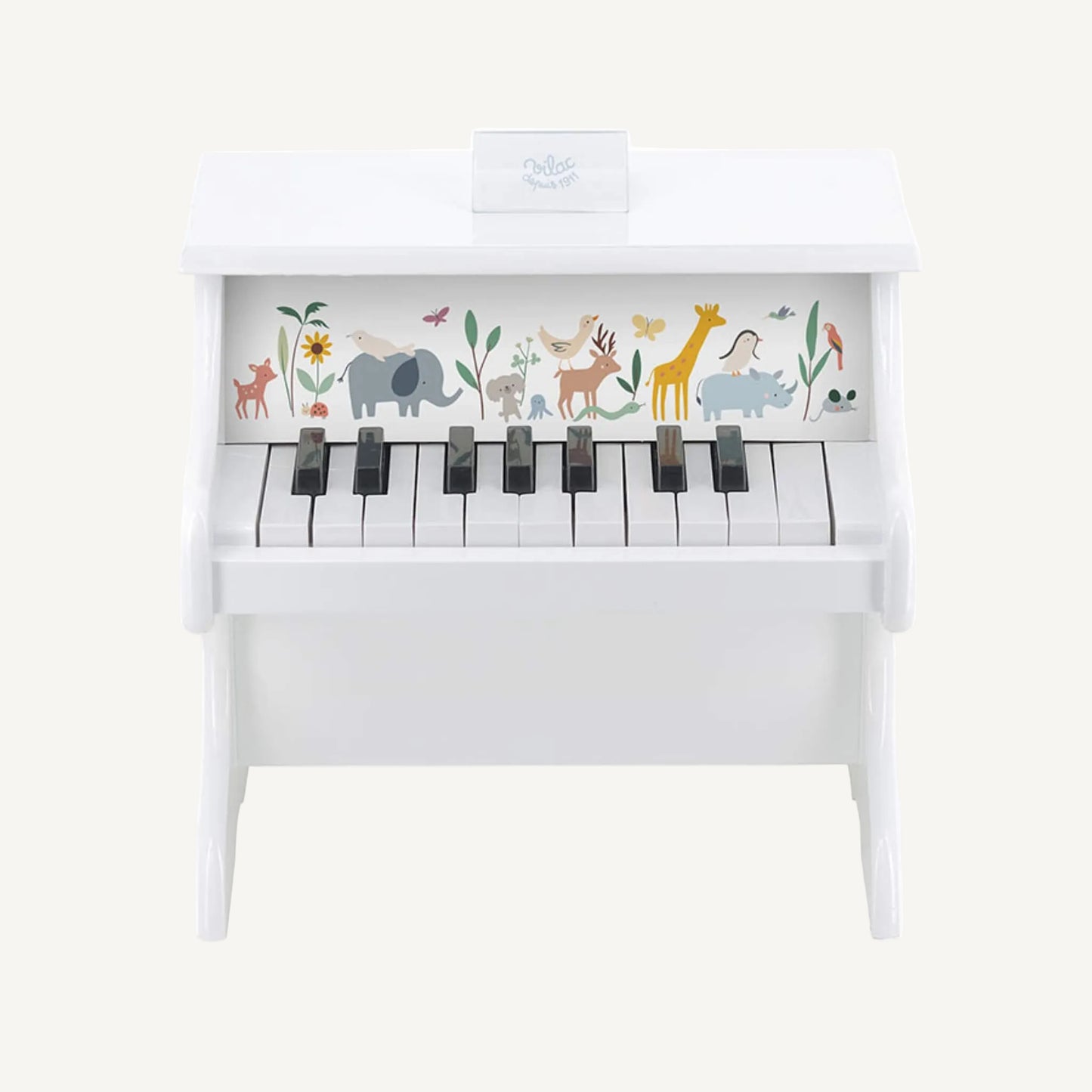 Front view of a white wooden toy piano with black keys and pastel animal illustrations including an elephant, giraffe, deer and rhino.