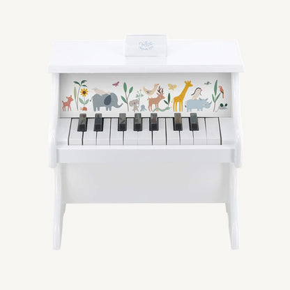 Front view of a white wooden toy piano with black keys and pastel animal illustrations including an elephant, giraffe, deer and rhino.
