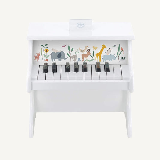 Front view of a white wooden toy piano with black keys and pastel animal illustrations including an elephant, giraffe, deer and rhino.