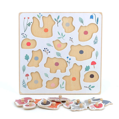 Back view of wooden peg puzzle board with animal-shaped cut-outs and colour guides.