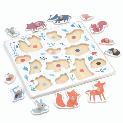Animated gif of a wooden peg puzzle showing where the animals slot into their matching spaces.