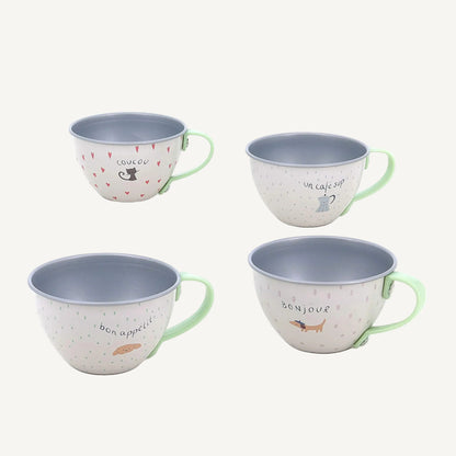 Four illustrated metal tea cups with French phrases and pastel green handles on a white background.