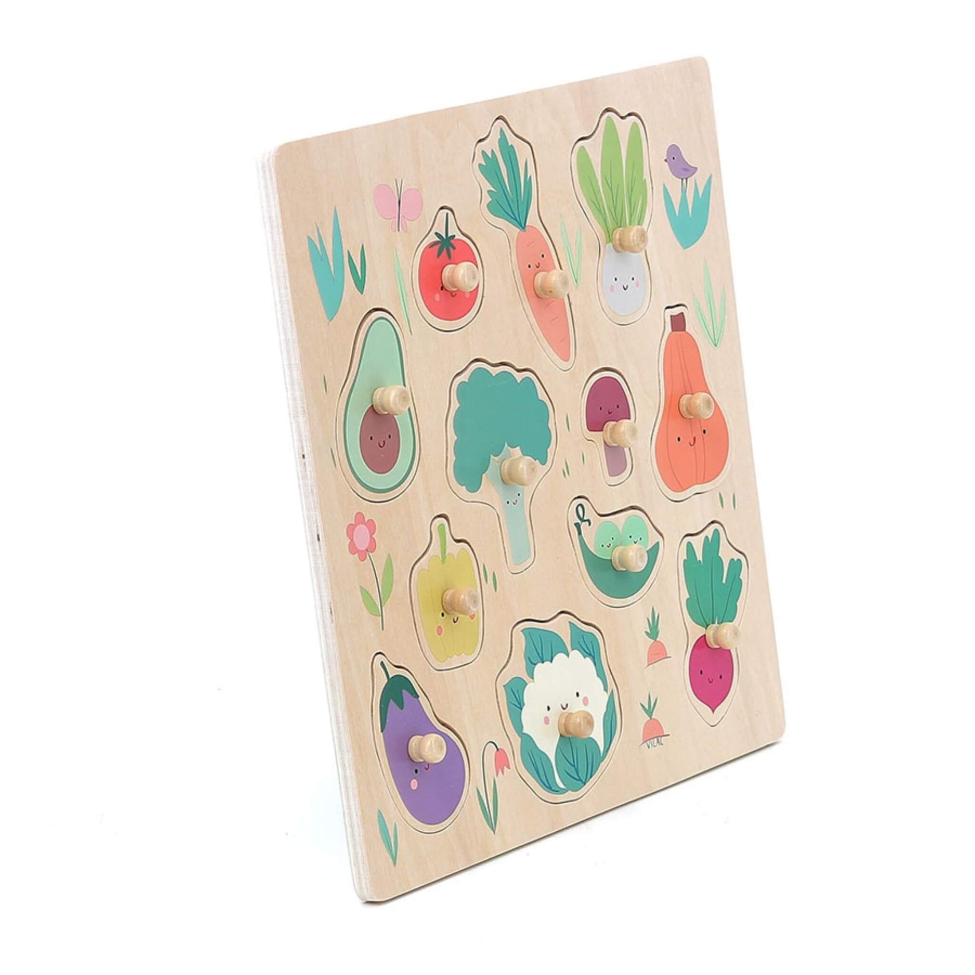 Angled view of vegetable peg puzzle featuring 12 colourful pieces with knobs for small hands to grasp