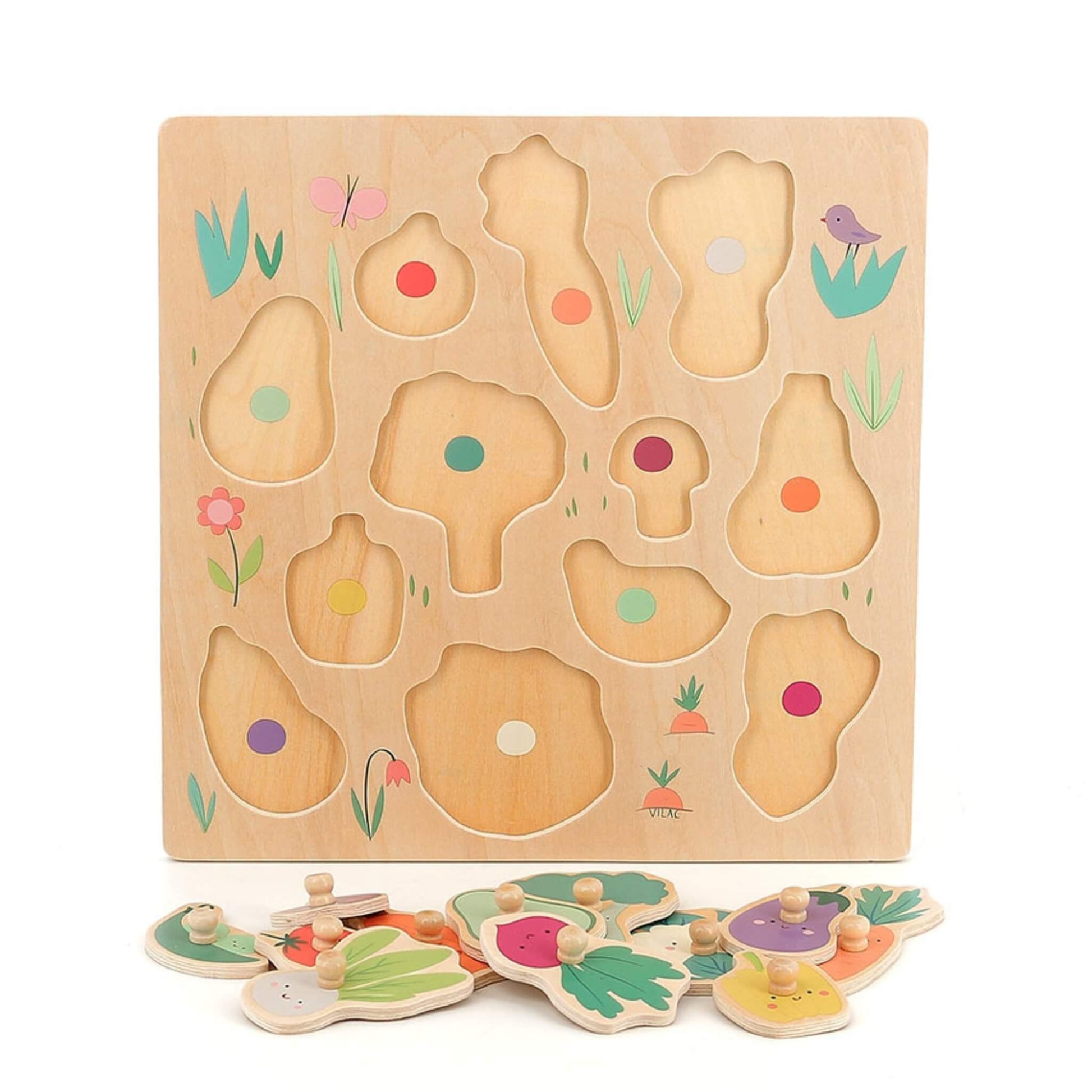 Wooden peg puzzle board with vegetable-shaped cut-outs and colour circles, pieces laid out in front.
