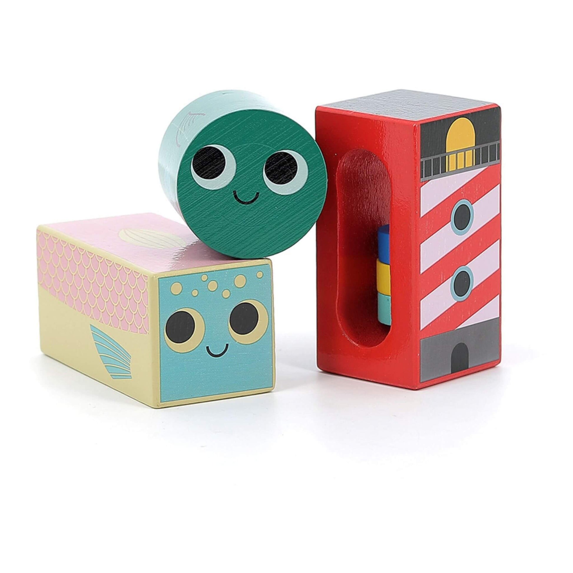 Three Sea Musical Blocks featuring a smiling green sea creature, a pastel mermaid block, and a red lighthouse with colourful details.