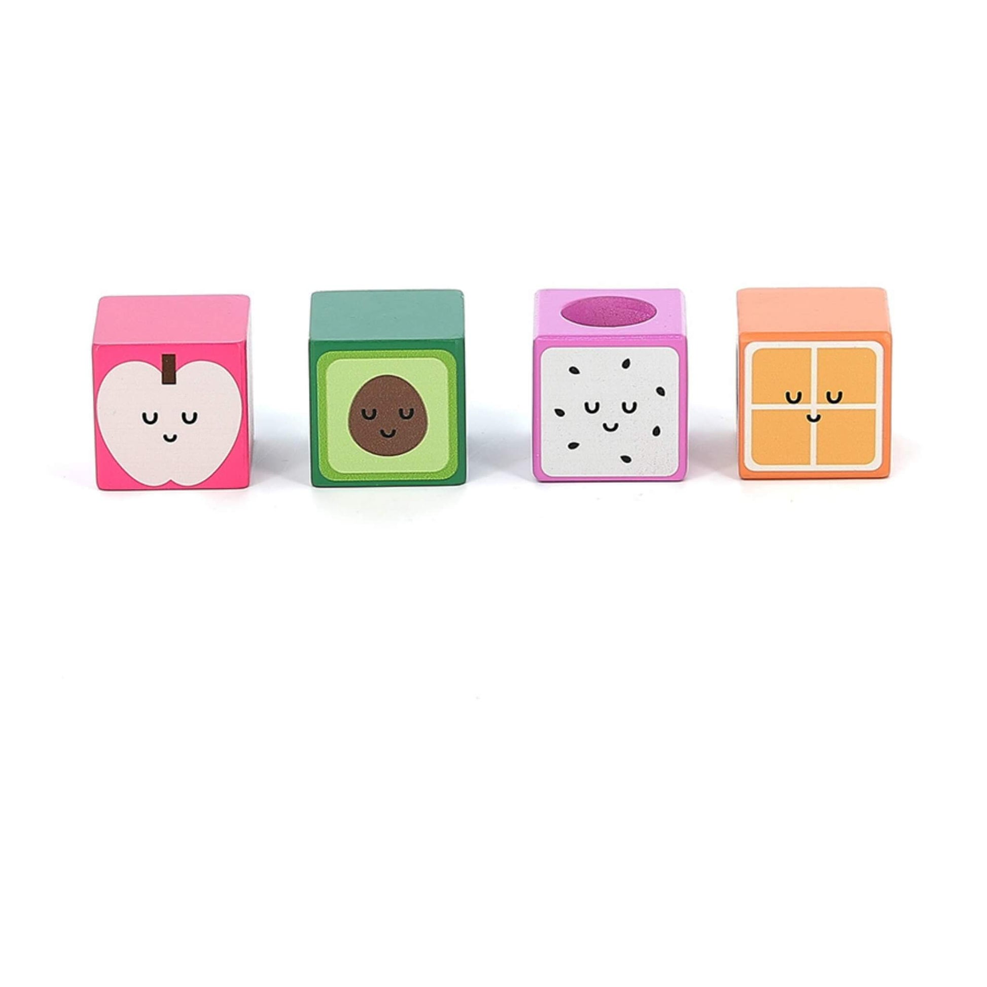Four cube-shaped wooden blocks painted as apple, avocado, dragon fruit, and orange segments with smiling faces, arranged in a row on a white background.