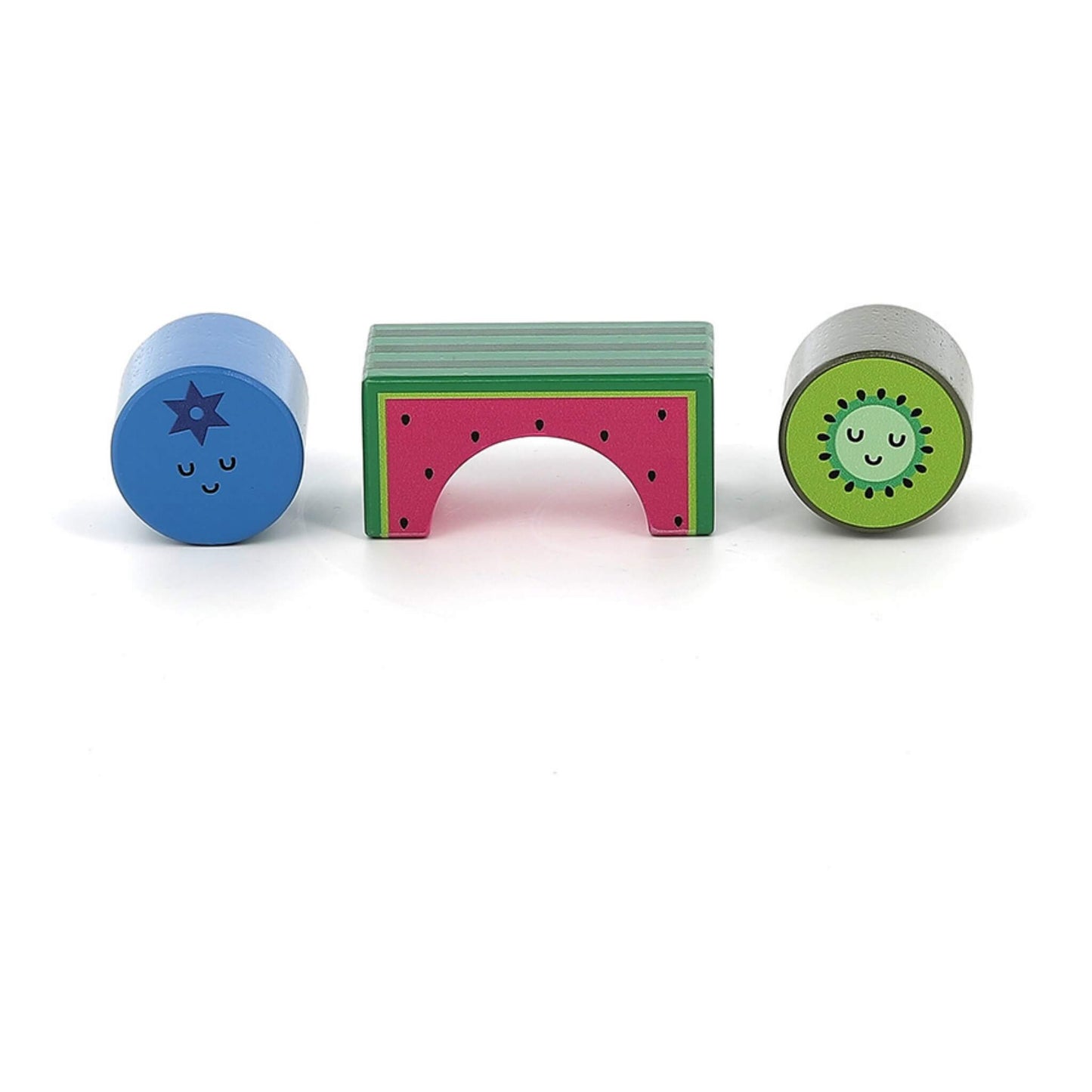 Two cylindrical wooden blocks painted as blueberry and kiwi, alongside an arch block painted as a slice of watermelon with seeds.