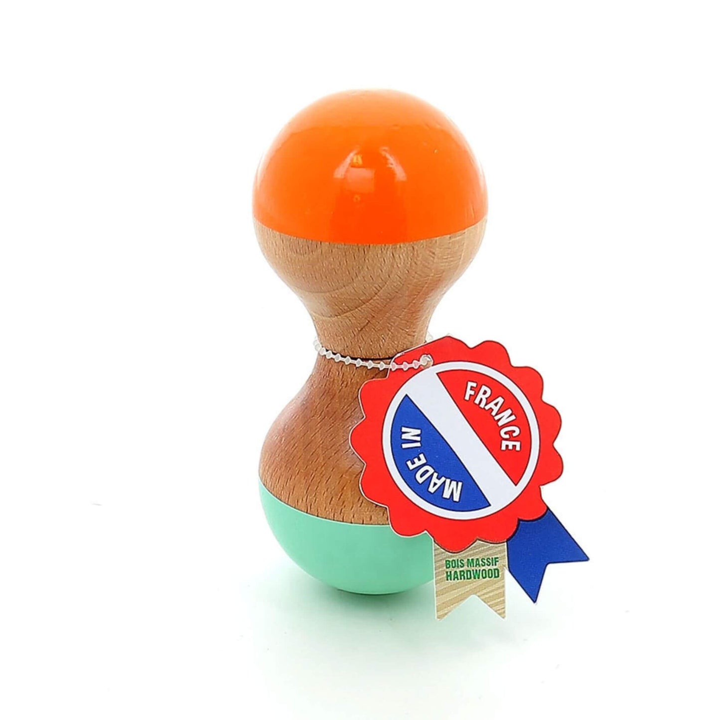 Mint and orange wooden maraca standing upright with a "Made in France" tag, featuring a smooth natural wood centre and glossy painted ends.