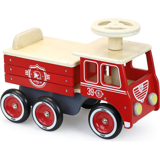 A beautifully made wooden ride-on fire truck with storage box under the seat and a special anti tilt system at the back so children can ride in complete safety.