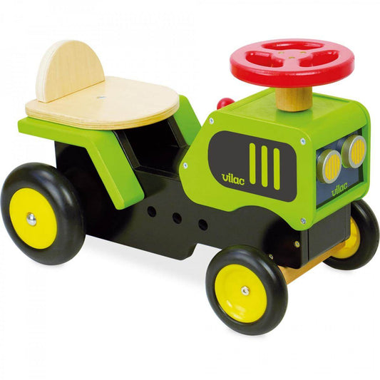 Wooden ride on tractor. This green tractor ride on toy is equipped with a horn and a gear lever with sound effects.