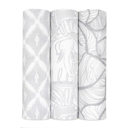 Rolled 3-pack Culture Club Silky Soft aden + anais Swaddles featuring delicate grey and white patterns, made from breathable bamboo muslin.
