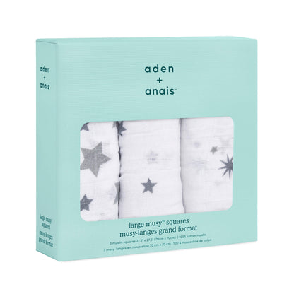 Boxed set of three aden + anais Twinkle muslin squares in soft grey star designs, shown in aqua packaging.