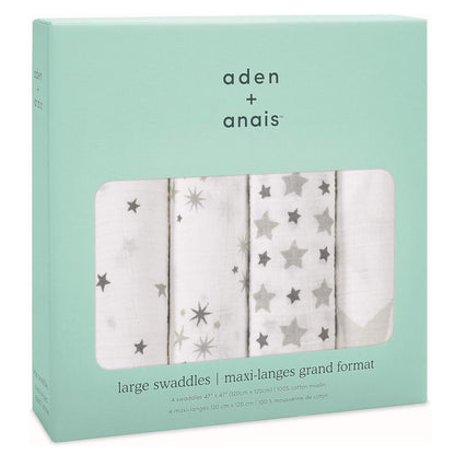 Boxed set of aden + anais Boutique Cotton Swaddles 4pk in Twinkle. Includes four breathable muslin wraps in grey and white star patterns.