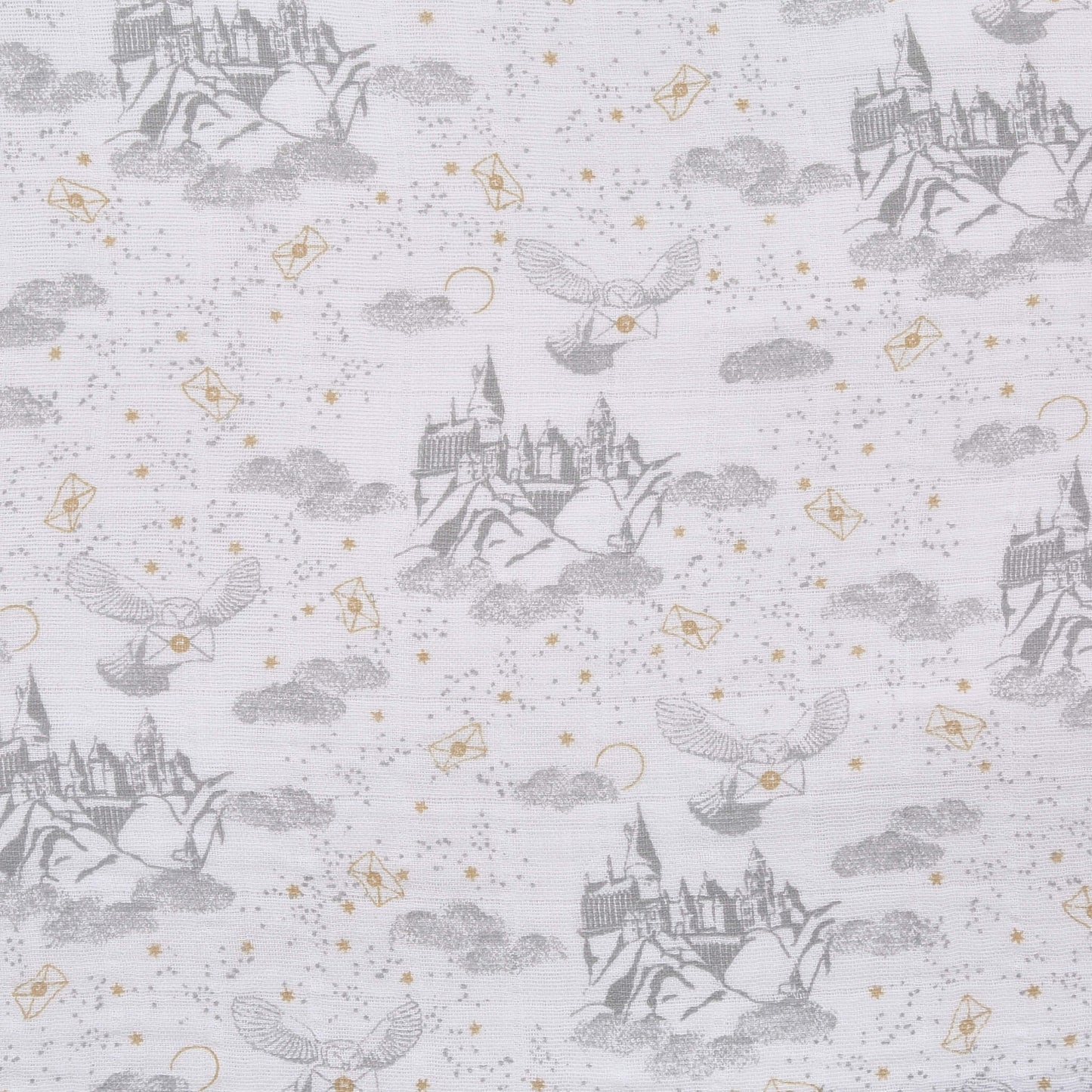 Detailed fabric swatch showing grey Hogwarts™ castle, clouds, and owls carrying letters from the aden + anais Harry Potter™ swaddle collection.