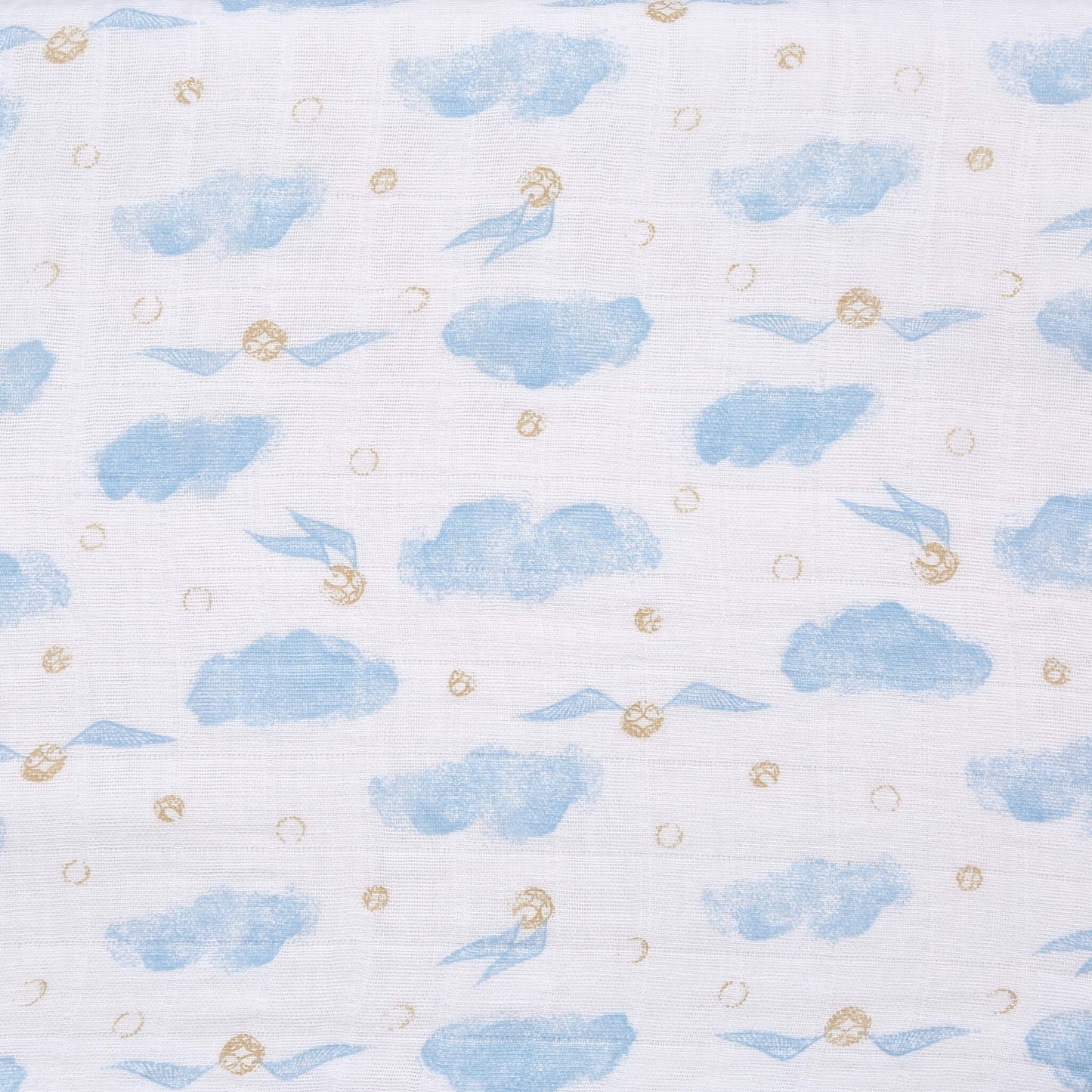 Close-up fabric swatch of the aden + anais Harry Potter™ muslin featuring blue clouds and golden snitch motifs on white background.
