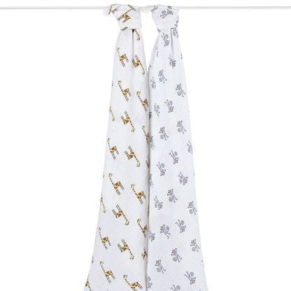 Full view of aden + anais Jungle Jam swaddles in fun giraffe and monkey prints. Lightweight and generously sized for everyday use.