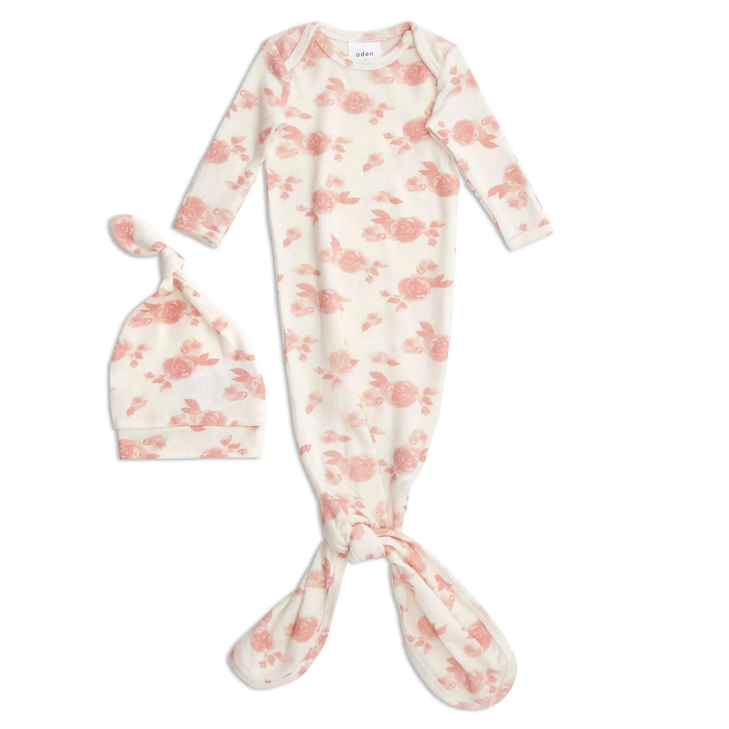 aden + anais Snuggle Knit newborn gown and knotted hat set in Rosettes print. Soft cream with delicate pink rose pattern.