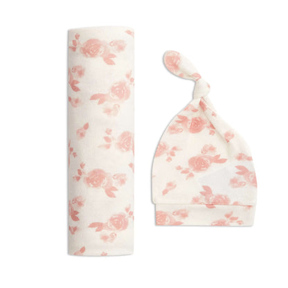 aden + anais Snuggle Knit Swaddle and Hat Set in Rosettes print. Features soft cream fabric with delicate pink rose design.