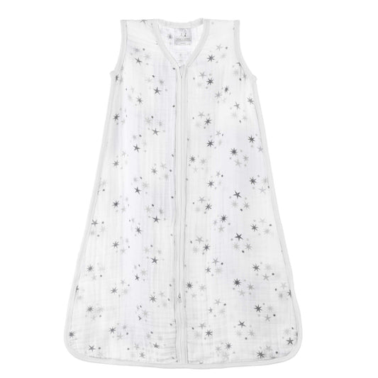 aden + anais Twinkle Light Sleeping Bag – flat lay of white cotton muslin bag with soft grey starburst print.