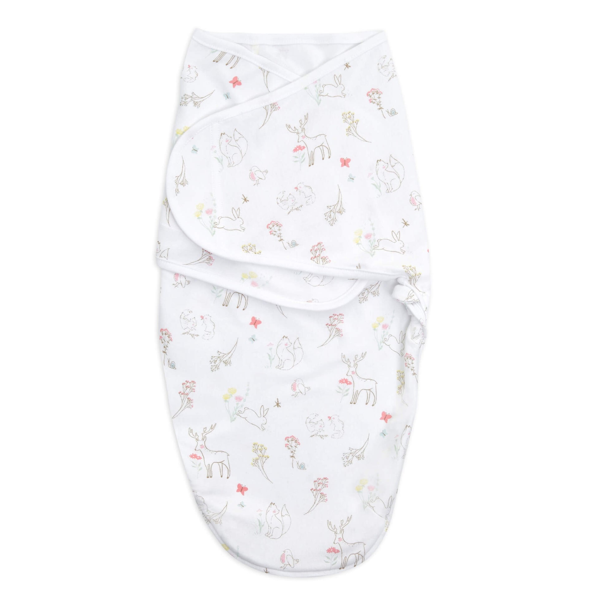 aden + anais baby swaddle with woodland creatures and pastel flowers on a white background, folded and fastened.