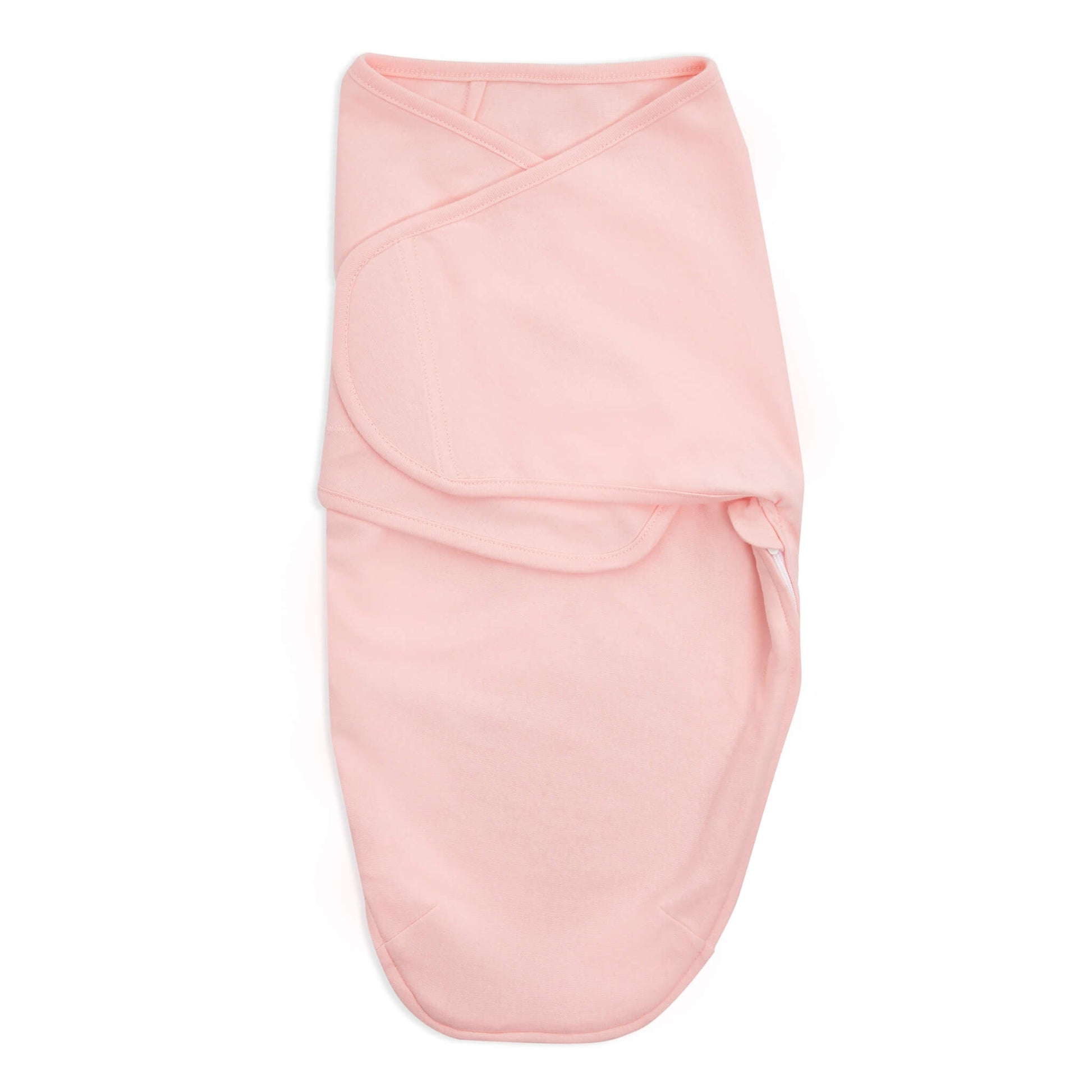Solid blush pink aden + anais cotton swaddle wrap, folded with hook-and-loop fastener visible.