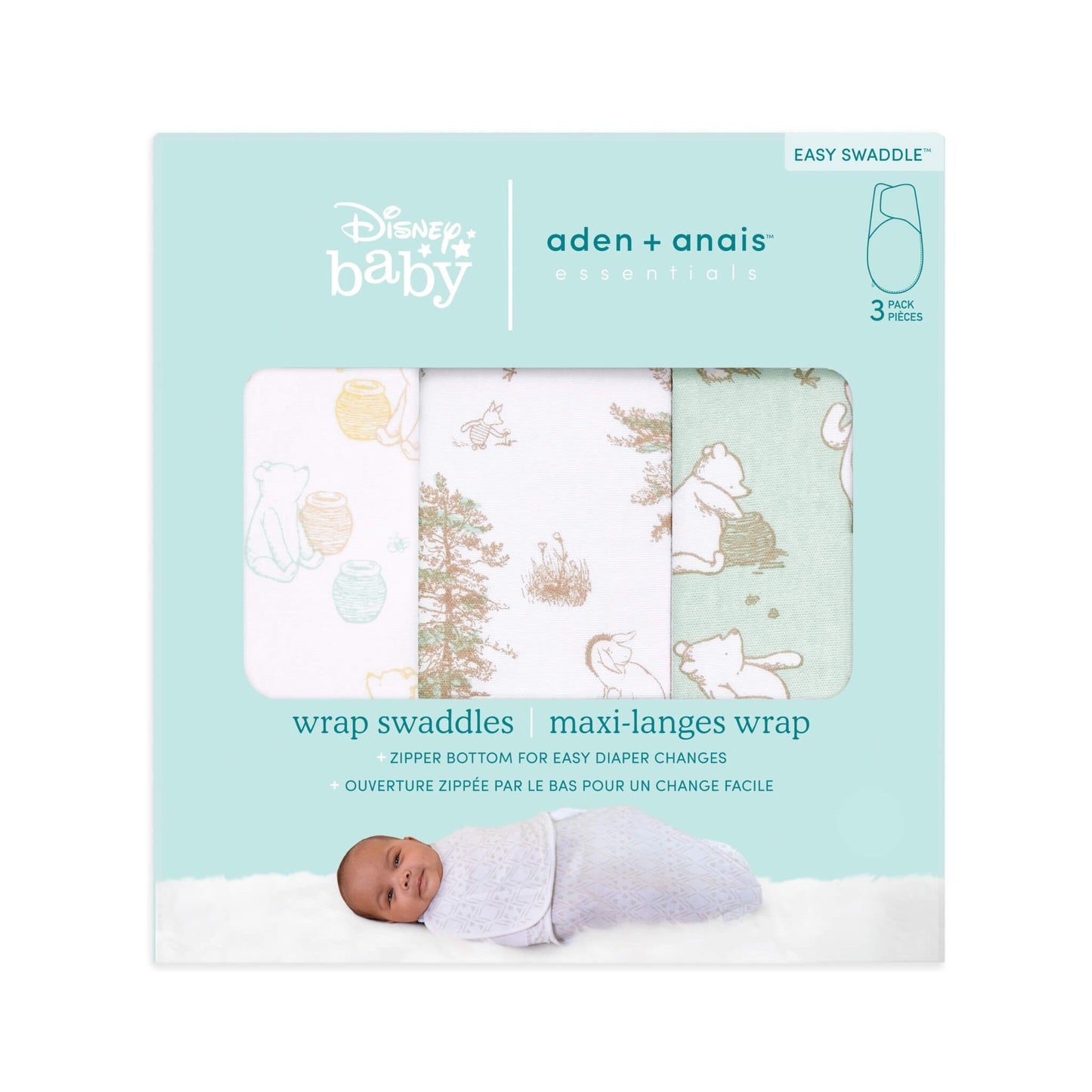 Retail packaging showing three folded swaddles inside a turquoise box with Disney Baby and aden + anais branding. Includes an image of a baby wrapped in a swaddle at the bottom.