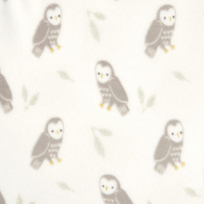 Close-up of Rockland Marsh swaddle with beige bear illustrations. Features playful bear silhouettes on a soft cream background.