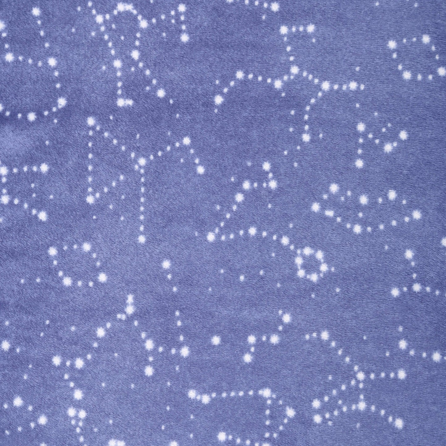 Close-up of navy constellation print on plush blue velboa fabric.