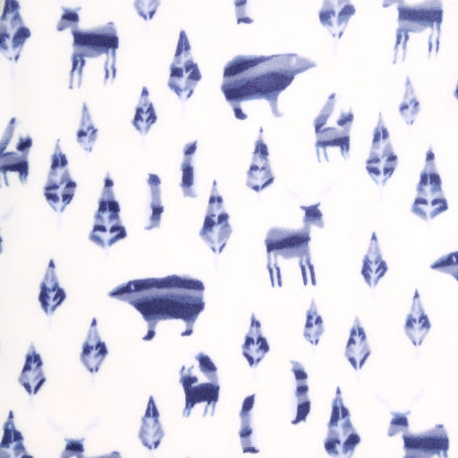 Close-up of blue woodland animals and trees printed on cream velboa fabric.
