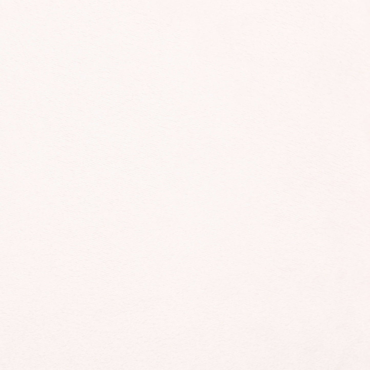 Close-up of the solid cream velboa swaddle fabric texture.