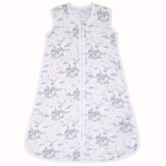 White sleeveless baby sleeping bag in breathable cotton muslin with grey Harry Potter castle, owl and cloud print and a front zip fastening.
