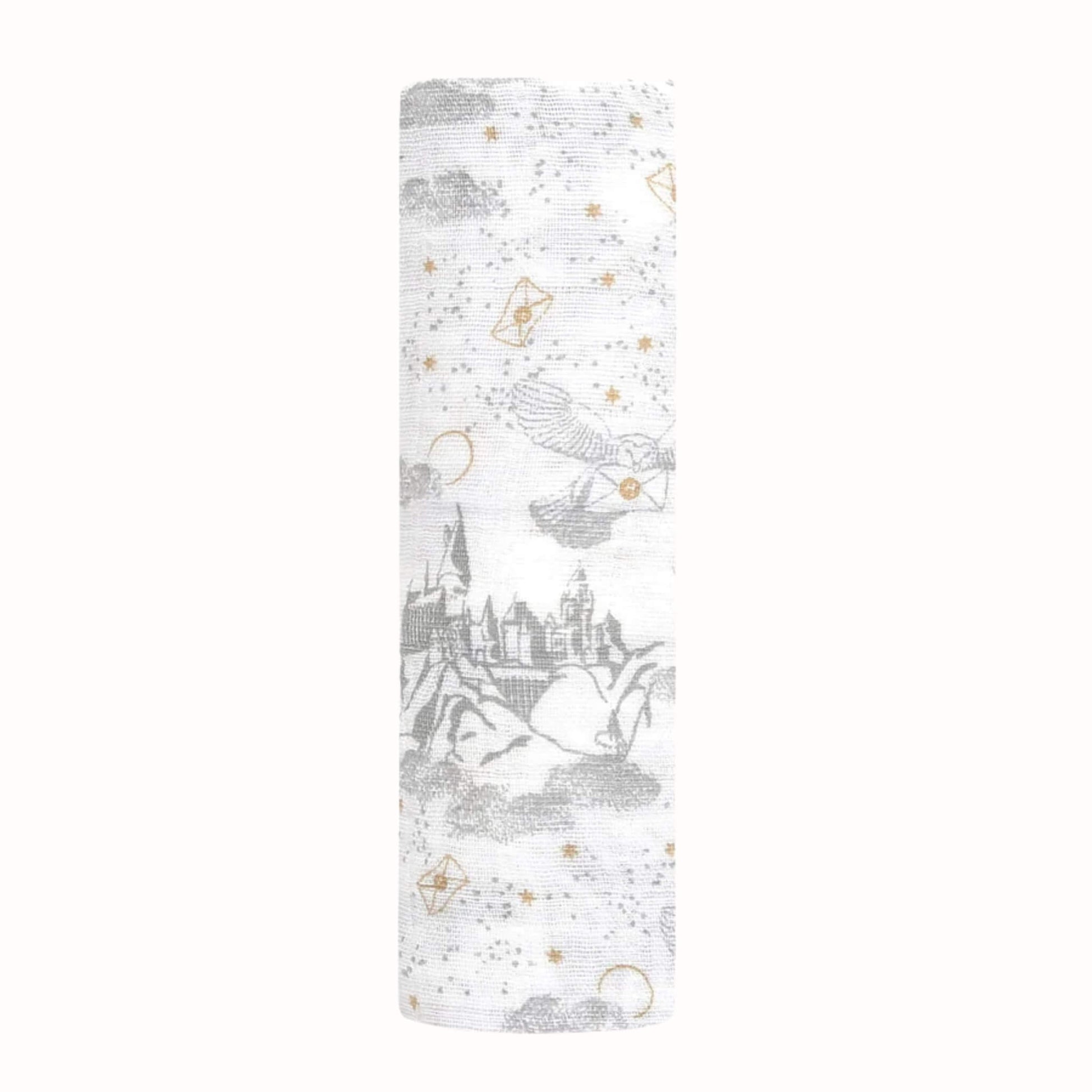 Rolled cotton muslin square featuring grey Hogwarts castle illustrations, owls, clouds and scattered gold stars on a white background.