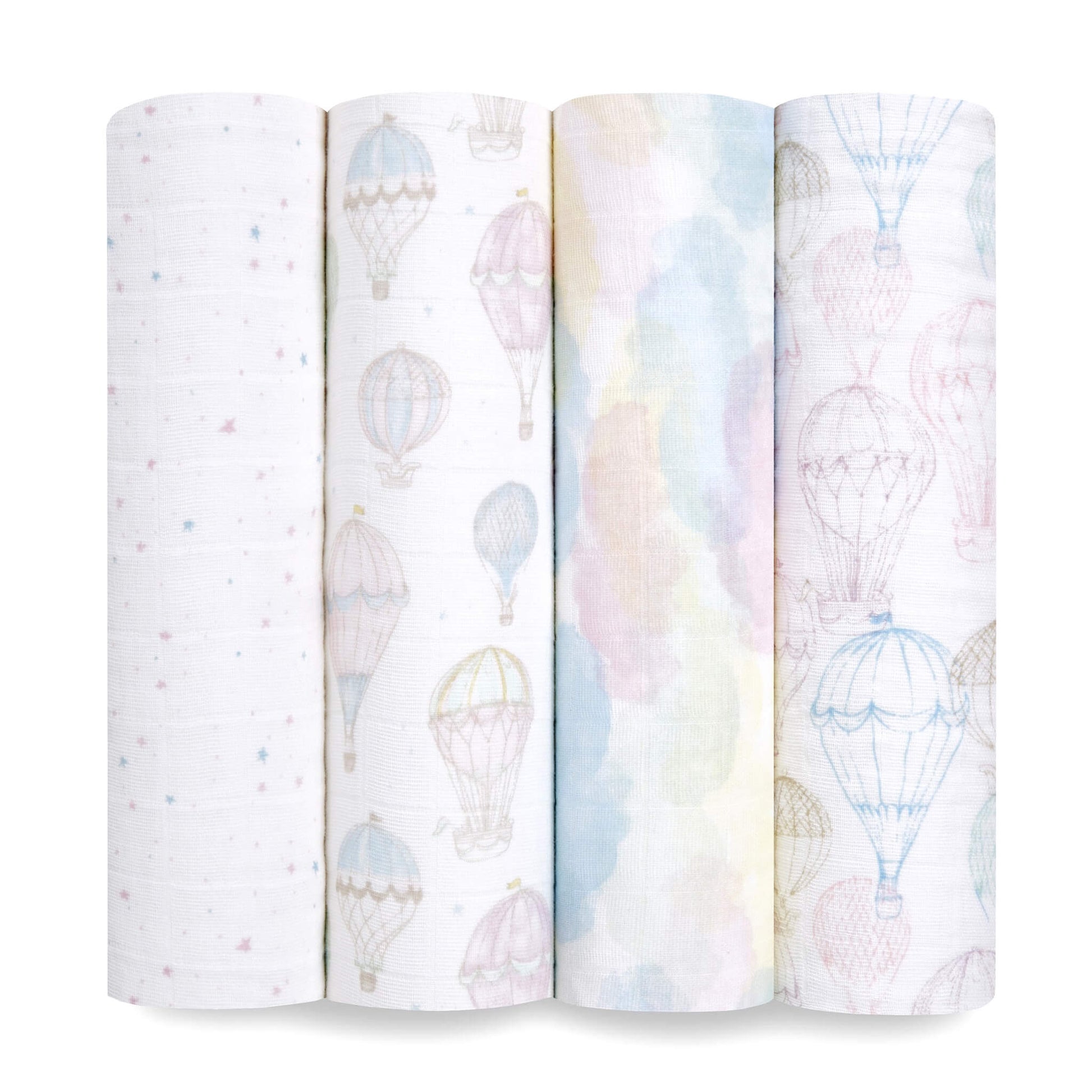 Set of four rolled aden + anais organic muslin swaddle blankets in soft pastel cloud and hot air balloon prints. GOTS certified and made from 100% organic cotton.