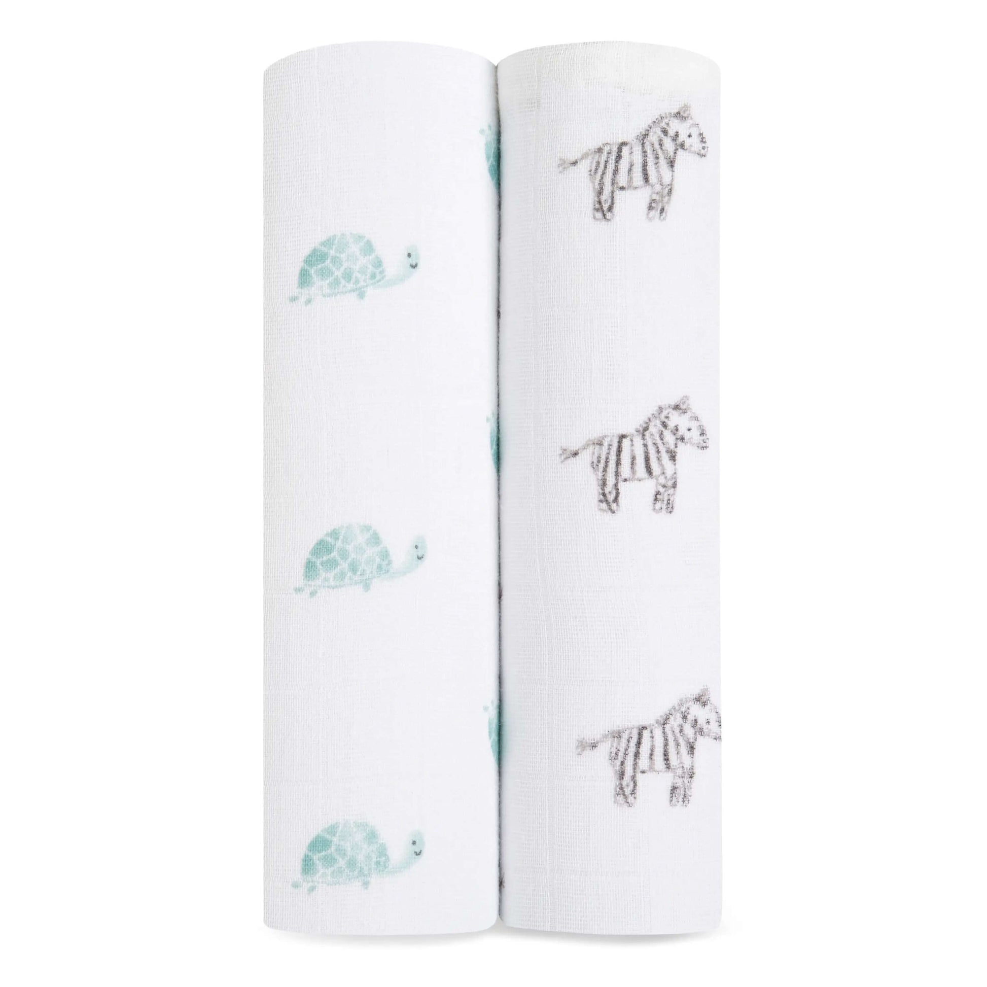 Close-up of aden + anais Animal Kingdom organic cotton swaddles, featuring turtles and zebras on soft white muslin.