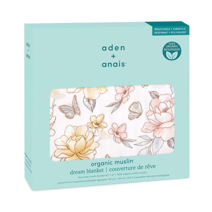aden + anais organic cotton dream blanket in retail packaging. Features floral butterfly print and GOTS certified label on mint green box.